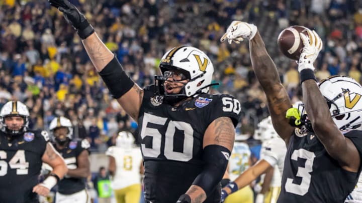 Chase Mitchell is back to his natural spot on Vanderbilt's offensive line.
