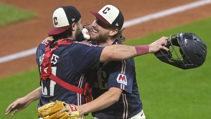 Sep 12, 2025; Cleveland, Ohio, USA; Cleveland Guardians catcher Austin Hedges (27) and starting pitcher Tanner Bibee (28) celebrate a win over the Chicago White Sox at Progressive Field. Mandatory Credit: David Richard-Imagn Images Sep 12, 2025; Cleveland, Ohio, USA; Cleveland Guardians catcher Austin Hedges (27) and starting pitcher Tanner Bibee (28) celebrate a win over the Chicago White Sox at Progressive Field. Mandatory Credit: David Richard-Imagn Images