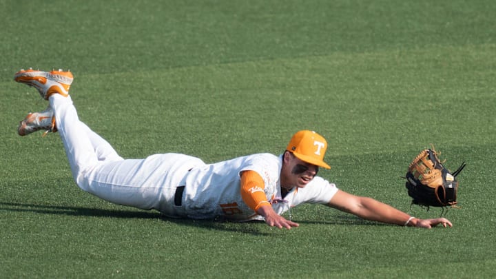 Tennessee's Dalton Bargo (16) dives after the ball at the NCAA college baseball Knoxville Regional final against Wake Forest on June 2, 2025, in Knoxville, Tenn.