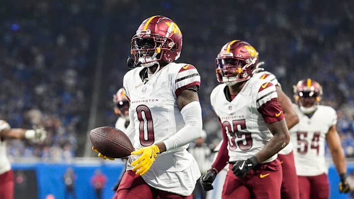 Washington Commanders cornerback Mike Sainristil (0) celebrates an interception against Detroit Lions during the first half of the NFC divisional round at Ford Field in Detroit on Saturday, Jan. 18, 2025.