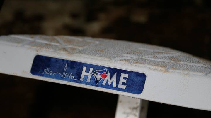 Jul 30, 2021; Toronto, Ontario, CAN; A close up of the Toronto Blue Jays logo on a spare base used during a game against the Kansas City Royals at Rogers Centre. Mandatory Credit: John E. Sokolowski-USA TODAY Sports Jul 30, 2021; Toronto, Ontario, CAN; A close up of the Toronto Blue Jays logo on a spare base used during a game against the Kansas City Royals at Rogers Centre. Mandatory Credit: John E. Sokolowski-USA TODAY Sports