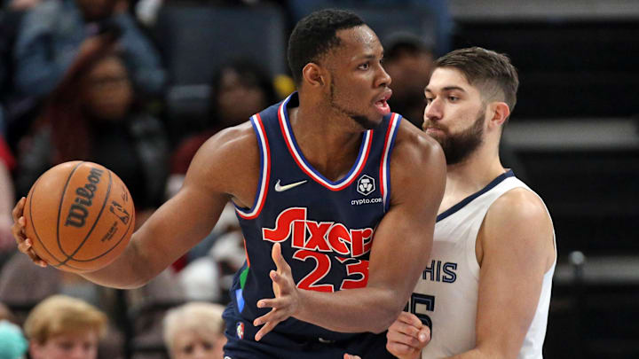 Dec 13, 2021; Memphis, Tennessee, USA; Philadelphia 76ers center Charles Bassey (23) dribbles toward the basket as Memphis Grizzles forward Killian Tillie (35) defends during the second half at FedExForum. Mandatory Credit: Petre Thomas-Imagn Images