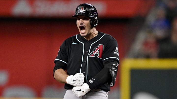 May 13, 2026; Arlington, Texas, USA; Arizona Diamondbacks third baseman Nolan Arenado (28) celebrates after he hits a double and drives in the tying run against the Texas Rangers during the ninth inning at Globe Life Field. Mandatory Credit: Jerome Miron-Imagn Images May 13, 2026; Arlington, Texas, USA; Arizona Diamondbacks third baseman Nolan Arenado (28) celebrates after he hits a double and drives in the tying run against the Texas Rangers during the ninth inning at Globe Life Field. Mandatory Credit: Jerome Miron-Imagn Images