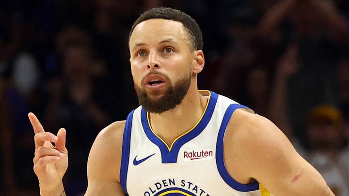 Apr 17, 2026; Phoenix, Arizona, USA; Golden State Warriors guard Stephen Curry (30) celebrates a shot against the Phoenix Suns during the first half in the play-in rounds of the 2026 NBA Playoffs at Mortgage Matchup Center. Mandatory Credit: Mark J. Rebilas-Imagn Images