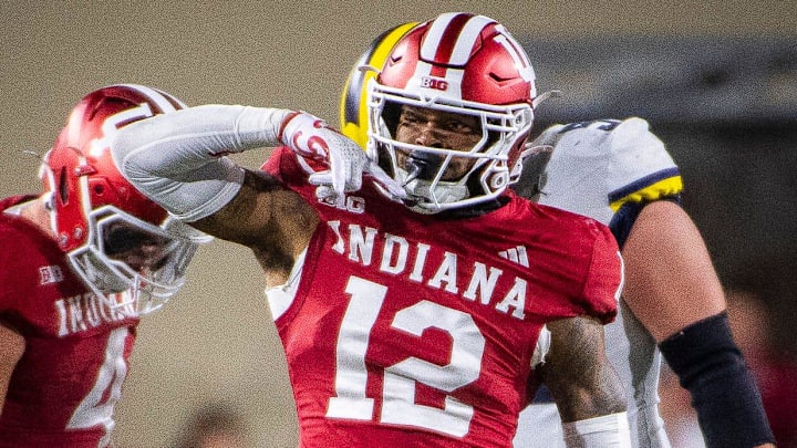 Indiana's Terry Jones Jr. (12) celebrates against Michigan at Memorial Stadium. Indiana's Terry Jones Jr. (12) celebrates against Michigan at Memorial Stadium.