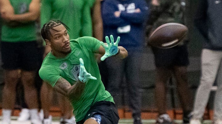 Oregon wide receiver Tez Johnson catches a pass during the Oregon football’s Pro Day Tuesday, March 18, 2025, at the Moshofsky Center in Eugene, Ore.