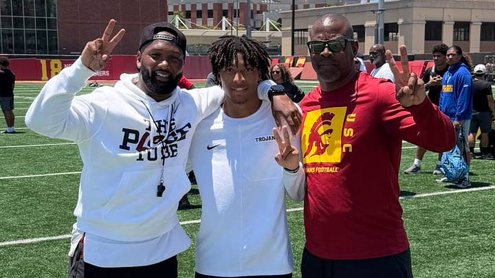 USC Trojans cornerbacks coach Trovon Reed and Salesian (Calif.) 2028 cornerback Jordan Slye USC Trojans cornerbacks coach Trovon Reed and Salesian (Calif.) 2028 cornerback Jordan Slye