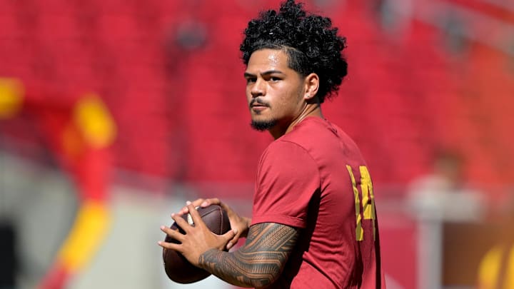 Sep 6, 2025; Los Angeles, California, USA;  USC Trojans quarterback Jayden Maiava (14) warms up prior to the game against the Georgia Southern Eagles at United Airlines Field at Los Angeles Memorial Coliseum. Mandatory Credit: Jayne Kamin-Oncea-Imagn Images