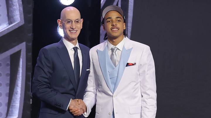 Jun 23, 2026; New York, NY, USA; NBA commissioner Adam Silver greets the sixth pick in the 2026 NBA draft, Louisville guard Mikel Brown Jr., after he was selected by the Brooklyn Nets at Barclays Center. Mandatory Credit: Brad Penner-Imagn Images