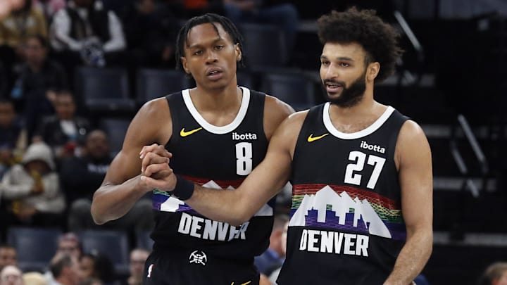 Nov 24, 2025; Memphis, Tennessee, USA; Denver Nuggets guard Peyton Watson (8) reacts with guard Jamal Murray (27) during the fourth quarter against the Memphis Grizzlies at FedExForum.