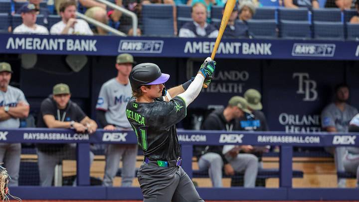 May 16, 2026; St. Petersburg, Florida, USA; Tampa Bay Rays right fielder Jonny DeLuca (21) hits during the sixth inning against the Miami Marlins at Tropicana Field. May 16, 2026; St. Petersburg, Florida, USA; Tampa Bay Rays right fielder Jonny DeLuca (21) hits during the sixth inning against the Miami Marlins at Tropicana Field.