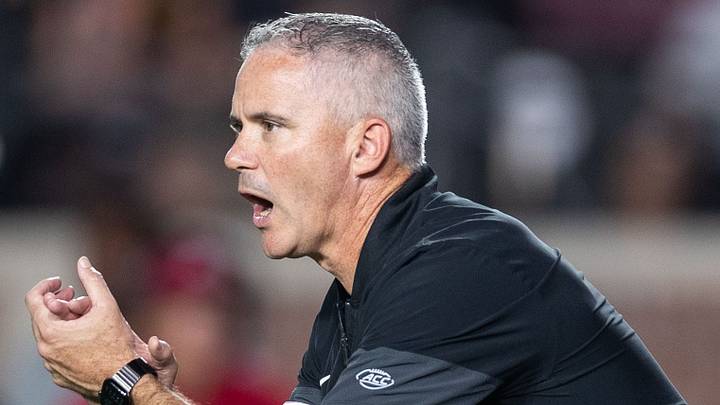 Florida State football coach Mike Norvell coaches his players as they warm up after the game was delayed due to a power outage. The SMU Mustangs lead the Florida State Seminoles 17-10 at the end of the first half Monday, Sept. 7, 2026. Florida State football coach Mike Norvell coaches his players as they warm up after the game was delayed due to a power outage. The SMU Mustangs lead the Florida State Seminoles 17-10 at the end of the first half Monday, Sept. 7, 2026.