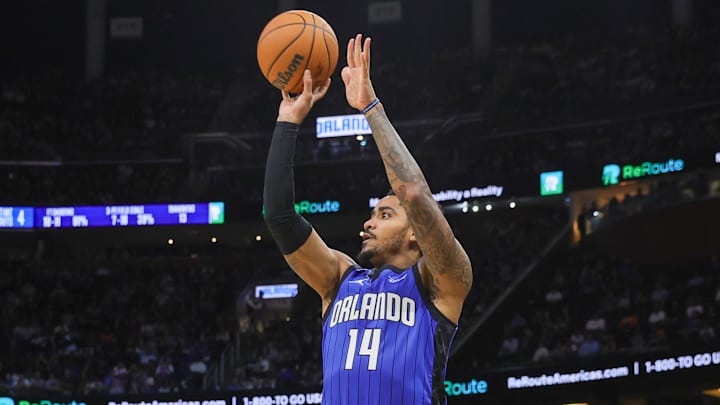 Dec 27, 2024; Orlando, Florida, USA; Orlando Magic guard Gary Harris (14) shoots during the second half against the New York Knicks at Kia Center. Mandatory Credit: Mike Watters-Imagn Images