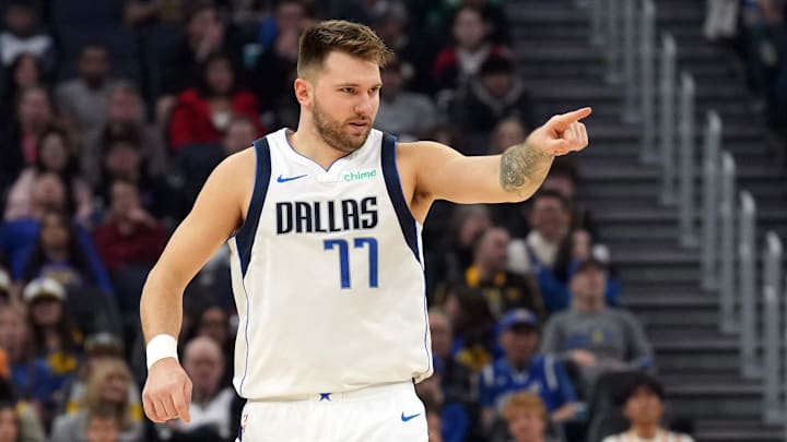 Dec 15, 2024; San Francisco, California, USA; Dallas Mavericks guard Luka Doncic (77) gestures after scoring against the Golden State Warriors during the first quarter at Chase Center. Mandatory Credit: Darren Yamashita-Imagn Images
