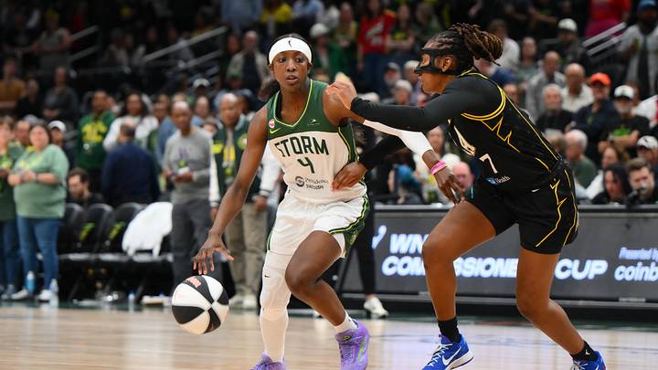 Jun 10, 2026; Seattle, Washington, USA; Seattle Storm guard Flau'jae Johnson (4) dribbles the ball while guarded by Los Angeles Sparks guard Ariel Atkins (7) during the second half at Climate Pledge Arena. Mandatory Credit: Steven Bisig-Imagn Images Jun 10, 2026; Seattle, Washington, USA; Seattle Storm guard Flau'jae Johnson (4) dribbles the ball while guarded by Los Angeles Sparks guard Ariel Atkins (7) during the second half at Climate Pledge Arena. Mandatory Credit: Steven Bisig-Imagn Images