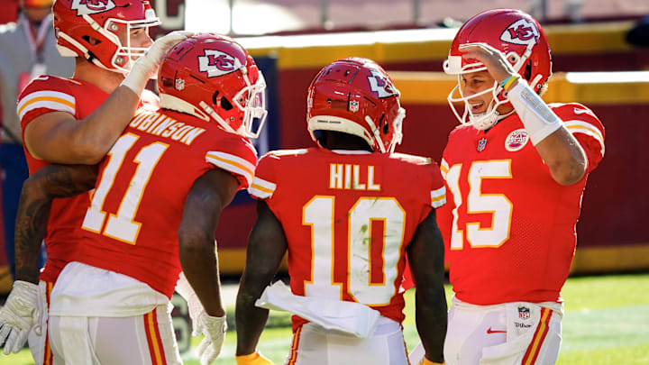 Nov 1, 2020; Kansas City, Missouri, USA; Kansas City Chiefs wide receiver Demarcus Robinson (11) is congratulated by quarterback Patrick Mahomes (15) and tight end Nick Keizer (48) and wide receiver Tyreek Hill (10) after scoring a touchdown against the New York Jets during the second half at Arrowhead Stadium. Mandatory Credit: Jay Biggerstaff-Imagn Images