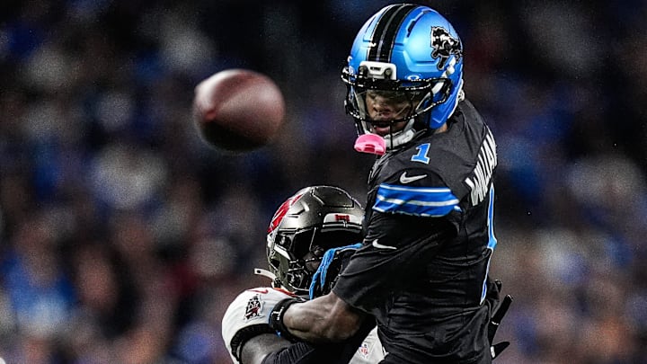 Detroit Lions wide receiver Jameson Williams (1) misses a pass intended for him against Tampa Bay Buccaneers safety Tykee Smith (23) during the second half at Ford Field in Detroit on Monday, Oct. 20, 2025. Detroit Lions wide receiver Jameson Williams (1) misses a pass intended for him against Tampa Bay Buccaneers safety Tykee Smith (23) during the second half at Ford Field in Detroit on Monday, Oct. 20, 2025.