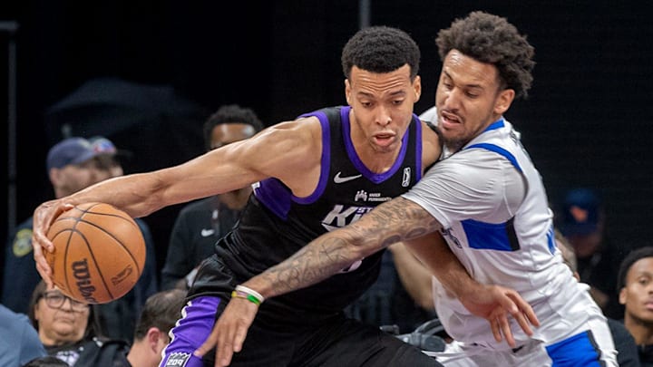 Stockton King’s Skal Labissiere, left, drives on Osceola Magic’s Alex Morales during game 2 of the NBA G League final against the Osceola Magic at the Adventist Health Arena in downtown Stockton on Apr. 11, 2025. The Kings won 144 to 126.