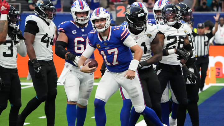 Oct 8, 2023; London United Kingdom, Buffalo Bills quarterback Josh Allen (17) reacts after scoring on a 3-yard touchdown run in the fourth quarter against the Jacksonville Jaguars during an NFL International Series game at Tottenham Hotspur Stadium. Mandatory Credit: Kirby Lee-USA TODAY Sports