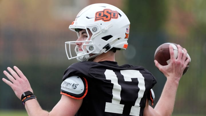 Oklahoma State quarterback Drew Mestemaker throws a pass during practice