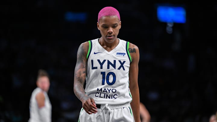 Aug 10, 2025; Brooklyn, New York, USA; Minnesota Lynx guard Courtney Williams (10) reacts during the first half against the New York Liberty at Barclays Center. Mandatory Credit: John Jones-Imagn Images