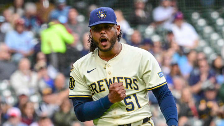 Sep 4, 2025; Milwaukee, Wisconsin, USA; Milwaukee Brewers starting pitcher Freddy Peralta (51) reacts after striking out Philadelphia Phillies third baseman Alec Bohm (not pictured) with the bases loaded in the fourth inning at American Family Field. Mandatory Credit: Benny Sieu-Imagn Images Sep 4, 2025; Milwaukee, Wisconsin, USA; Milwaukee Brewers starting pitcher Freddy Peralta (51) reacts after striking out Philadelphia Phillies third baseman Alec Bohm (not pictured) with the bases loaded in the fourth inning at American Family Field. Mandatory Credit: Benny Sieu-Imagn Images