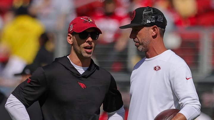 Oct 1, 2023; Santa Clara, California, USA; San Francisco 49ers head coach Kyle Shanahan and Arizona Cardinals head coach Jonathan Gannon meet before the game at Levi's Stadium. Mandatory Credit: Sergio Estrada-Imagn Images