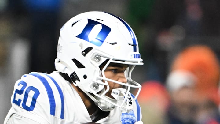 Dec 6, 2025; Charlotte, NC, USA; Duke Blue Devils running back Nate Sheppard (20) receives a hand off in the second quarter against the Virginia Cavaliers during the 2025 ACC Championship game at Bank of America Stadium. Mandatory Credit: Bob Donnan-Imagn Images