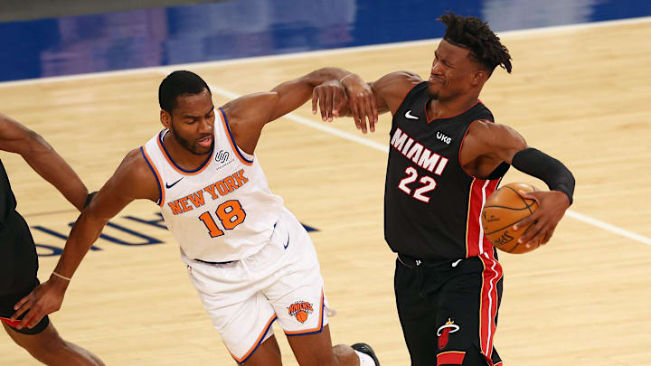 Mar 29, 2021; New York, New York, USA;  Miami Heat forward Jimmy Butler (22) drives to the basket against New York Knicks guard Alec Burks (18) at Madison Square Garden. Mandatory Credit: Mike Stobe/POOL PHOTOS-Imagn Images