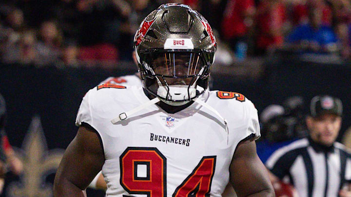 Oct 13, 2024; New Orleans, Louisiana, USA;  Tampa Bay Buccaneers defensive tackle Calijah Kancey (94) run on the field against the New Orleans Saints during the first half at Caesars Superdome. Mandatory Credit: Stephen Lew-Imagn Images
