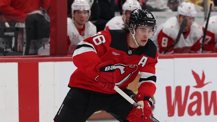 Mar 8, 2026; Newark, New Jersey, USA;  New Jersey Devils center Jack Hughes (86) controls the puck against the Detroit Red Wings during the second period at Prudential Center. Mandatory Credit: Thomas Salus-Imagn Images