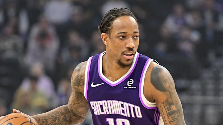 Feb 11, 2026; Salt Lake City, Utah, USA; Sacramento Kings guard/forward DeMar DeRozan (10) stares down Utah Jazz forward Jaren Jackson Jr. (20) during the first half at Delta Center. 