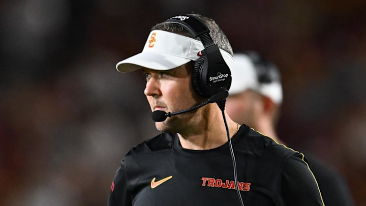 Sep 7, 2024; Los Angeles, California, USA; USC Trojans head coach Lincoln Riley reacts against the Utah State Aggies during the second quarter at United Airlines Field at Los Angeles Memorial Coliseum. Mandatory Credit: Jonathan Hui-Imagn Images Sep 7, 2024; Los Angeles, California, USA; USC Trojans head coach Lincoln Riley reacts against the Utah State Aggies during the second quarter at United Airlines Field at Los Angeles Memorial Coliseum. Mandatory Credit: Jonathan Hui-Imagn Images