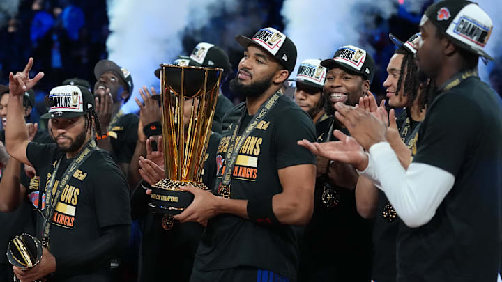 Dec 16, 2025; Las Vegas, Nevada, USA; New York Knicks center Karl-Anthony Towns (32) and teammates react after winning the Emirates NBA Cup Final at T-Mobile Arena. Mandatory Credit: Kirby Lee-Imagn Images