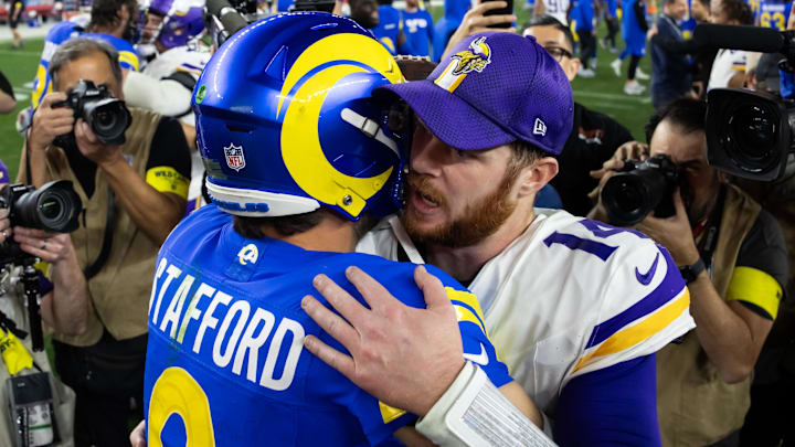 Jan 13, 2025; Glendale, AZ, USA; Los Angeles Rams quarterback Matthew Stafford (9) greets Minnesota Vikings quarterback Sam Darnold (14) following an NFC wild card game at State Farm Stadium. Mandatory Credit: Mark J. Rebilas-Imagn Images Jan 13, 2025; Glendale, AZ, USA; Los Angeles Rams quarterback Matthew Stafford (9) greets Minnesota Vikings quarterback Sam Darnold (14) following an NFC wild card game at State Farm Stadium. Mandatory Credit: Mark J. Rebilas-Imagn Images