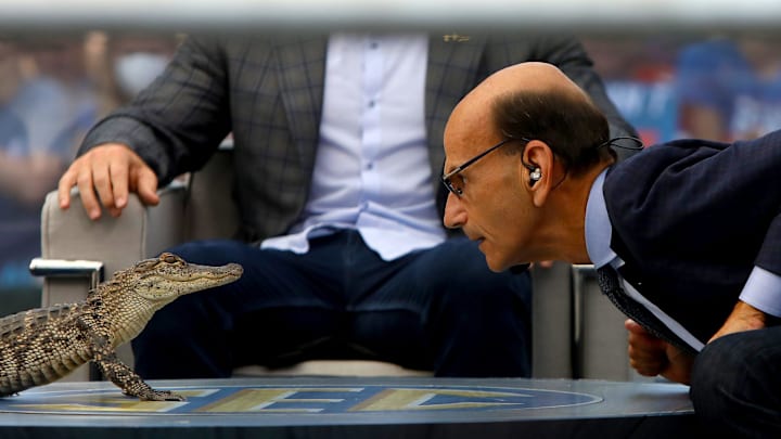 SEC Nation host Paul Finebaum stares down a live alligator SEC Nation host Paul Finebaum stares down a live alligator