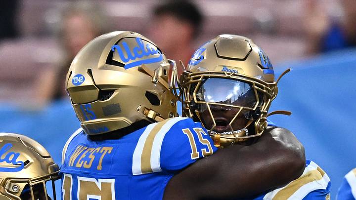 Sep 12, 2026; Pasadena, California, USA; UCLA linebacker Jalen Woods (9) celebrates with teammates after an interception during the second half against San Diego State at the Rose Bowl. Mandatory Credit: William Liang-Imagn Images Sep 12, 2026; Pasadena, California, USA; UCLA linebacker Jalen Woods (9) celebrates with teammates after an interception during the second half against San Diego State at the Rose Bowl. Mandatory Credit: William Liang-Imagn Images