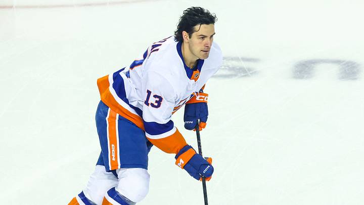 Jan 17, 2026; Calgary, Alberta, CAN; New York Islanders center Mathew Barzal (13) skates with the puck during the warmup period against the Calgary Flames at Scotiabank Saddledome. Mandatory Credit: Sergei Belski-Imagn Images