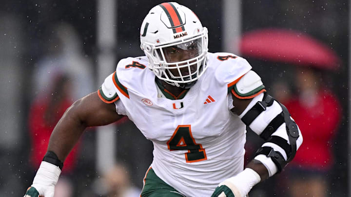Nov 1, 2025; Dallas, Texas, USA;  Miami Hurricanes defensive lineman Rueben Bain Jr. (4) rushes the line during the game between the Mustangs and the Hurricanes at Gerald J. Ford Stadium. Mandatory Credit: Jerome Miron-Imagn Images