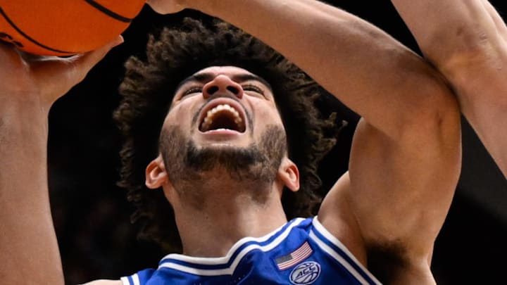 Jan 17, 2026; Stanford, California, USA; Duke Blue Devils forward Cameron Boozer (12) gets fouled by Stanford Cardinal forward AJ Rohosy (4) in the second half at Maples Pavilion. Mandatory Credit: Eakin Howard-Imagn Images Jan 17, 2026; Stanford, California, USA; Duke Blue Devils forward Cameron Boozer (12) gets fouled by Stanford Cardinal forward AJ Rohosy (4) in the second half at Maples Pavilion. Mandatory Credit: Eakin Howard-Imagn Images
