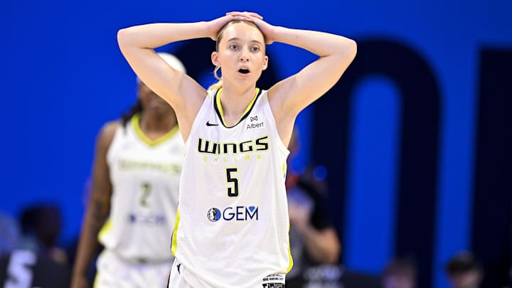 Sep 11, 2025; Arlington, Texas, USA; Dallas Wings guard Paige Bueckers (5) reacts to a call during the first half against the Phoenix Mercury at College Park Center. Mandatory Credit: Jerome Miron-Imagn Images