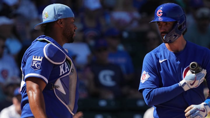 Mar 11, 2026; Mesa, Arizona, USA; Chicago Cubs shortstop Dansby Swanson (7) talks to Kansas City Royals catcher Elias Diaz in the second inning at Sloan Park. Mandatory Credit: Rick Scuteri-Imagn Images Mar 11, 2026; Mesa, Arizona, USA; Chicago Cubs shortstop Dansby Swanson (7) talks to Kansas City Royals catcher Elias Diaz in the second inning at Sloan Park. Mandatory Credit: Rick Scuteri-Imagn Images