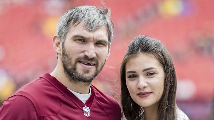 Washington Capitals Alexander Ovechkin (8) poses for a photo with his wife Anastasia Washington Capitals Alexander Ovechkin (8) poses for a photo with his wife Anastasia