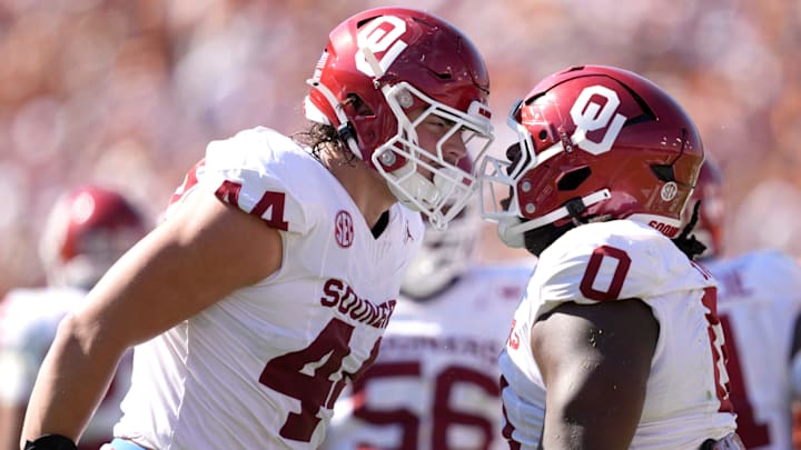 Oklahoma defensive end Taylor Wein (44) and defensive tackle David Stone