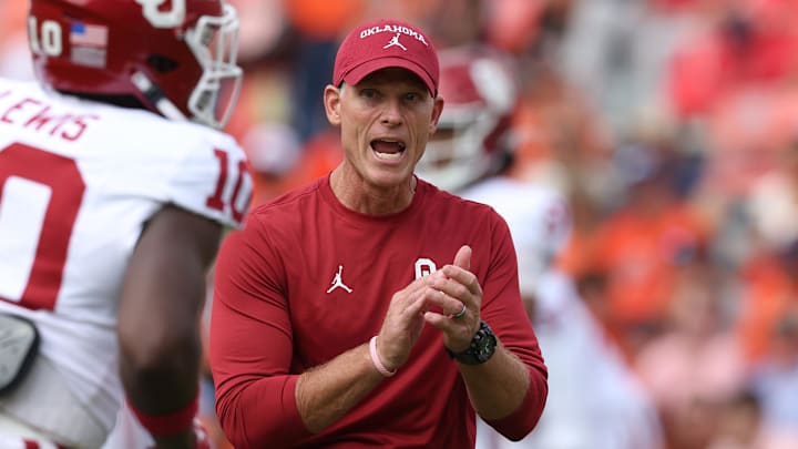 Oklahoma Sooners head coach Brent Venables watches his team warm up before their game against the Auburn Tigers at Jordan-Hare Stadium.