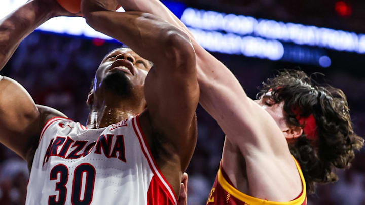 Mar 2, 2026; Tucson, Arizona, USA; Iowa State Cyclones forward Milan Momcilovic (22) fouls Arizona Wildcats forward Tobe Awaka (30) during the second half of the game at McKale Memorial Center. Mandatory Credit: Aryanna Frank-Imagn Images Mar 2, 2026; Tucson, Arizona, USA; Iowa State Cyclones forward Milan Momcilovic (22) fouls Arizona Wildcats forward Tobe Awaka (30) during the second half of the game at McKale Memorial Center. Mandatory Credit: Aryanna Frank-Imagn Images