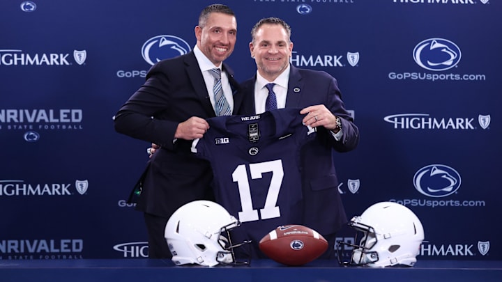 Matt Campbell, left,  and Penn State University athletic director Pat Kraft