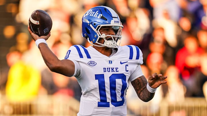Nov 8, 2025; East Hartford, Connecticut, USA; Duke Blue Devils quarterback Darian Mensah (10) throws a pass against the UConn Huskies in the first quarter at Pratt & Whitney Stadium at Rentschler Field. Mandatory Credit: David Butler II-Imagn Images