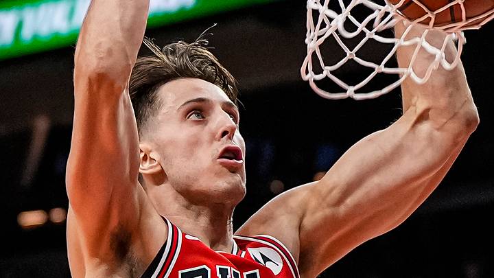 Dec 21, 2025; Atlanta, Georgia, USA; Chicago Bulls forward Zach Collins (12) dunks against the Atlanta Hawks during the second half at State Farm Arena. Mandatory Credit: Dale Zanine-Imagn Images