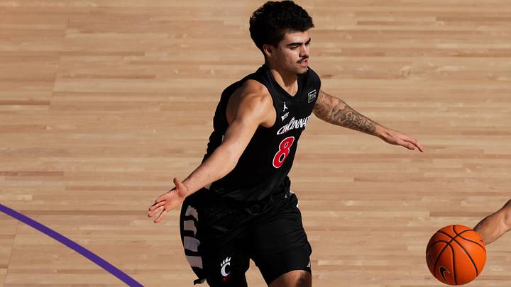 Oct 7, 2026; Mason, OH, USA; Ohio State Buckeyes guard John Mobley Jr. (0) passes the ball against Cincinnati Bearcats forward Tyler Tejada (8) in the first half during the 2026 CareSource Invitational at the Lindner Family Tennis Center. Mandatory Credit: Aaron Doster-Imagn Images Oct 7, 2026; Mason, OH, USA; Ohio State Buckeyes guard John Mobley Jr. (0) passes the ball against Cincinnati Bearcats forward Tyler Tejada (8) in the first half during the 2026 CareSource Invitational at the Lindner Family Tennis Center. Mandatory Credit: Aaron Doster-Imagn Images